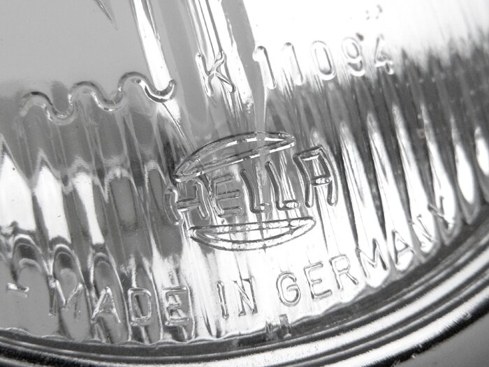 Headlight -IMPORT- VNB, VBA,VBB1, GS150 / GS3, GS160 / GS4 (VSB1T) - Hella Logo