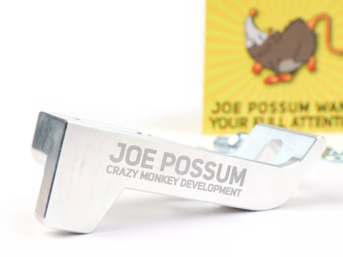 Adaptador amortiguador trasero -CMD Joe Possum- Vespa Smallframe V50, PV125, ET3 - para reubicar el amortiguador cuando se utilizan sistemas de escape de resonancia.