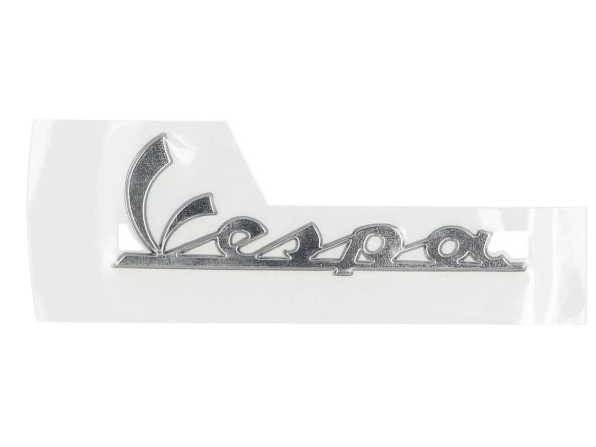 Penutup samping huruf -PIAGGIO- Vespa (115x37mm) - Vespa Primavera 125 (ZAPMA1100, ZAPMA1101), Vespa Primavera 50 (ZAPCA0100), Vespa Sprint 125 (ZAPMA1300, ZAPMA1301), Vespa Sprint 150 (ZAPMA1400, ZAPMA1401, ZAPMD1201), Vespa Sprint 50 (ZAPCA0101, ZAPCA0