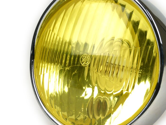 Strålkastare -BOSATTA Ø=115/120mm (glas/utsida)- Vespa VNB3T till VNB6T, VBA1T, VBB1T till VBB2T, GS150 / GS3 (VS4T till VS5T), GS160 / GS4 (VSB1T) - gult plastglas, inkl. trimring