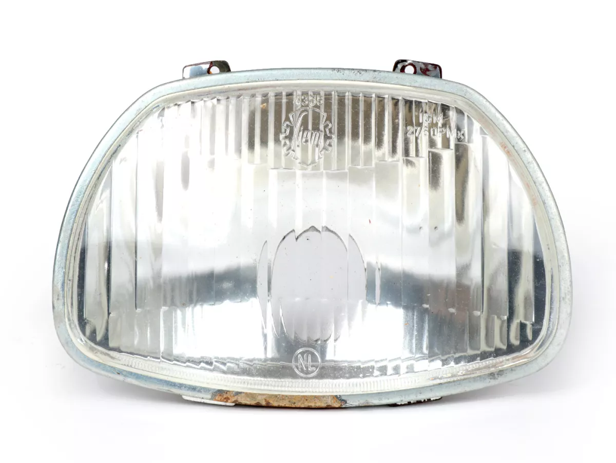 Koplamp -SIEM (NOS) trapezium - Vespa APE AD1, AE, AP ook geschikt voor Sprint150 (VLB1T), GL150 (VLA1T), GT125 (VNL2T), SS180 (VSC1T) - glas, incl. sierring, zonder koplampstekker
