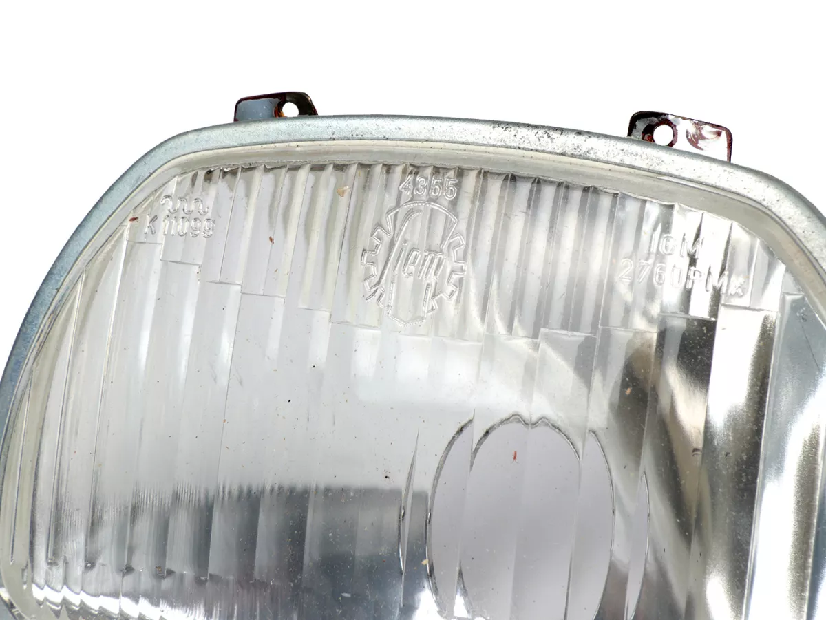 Koplamp -SIEM (NOS) trapezium - Vespa APE AD1, AE, AP ook geschikt voor Sprint150 (VLB1T), GL150 (VLA1T), GT125 (VNL2T), SS180 (VSC1T) - glas, incl. sierring, zonder koplampstekker