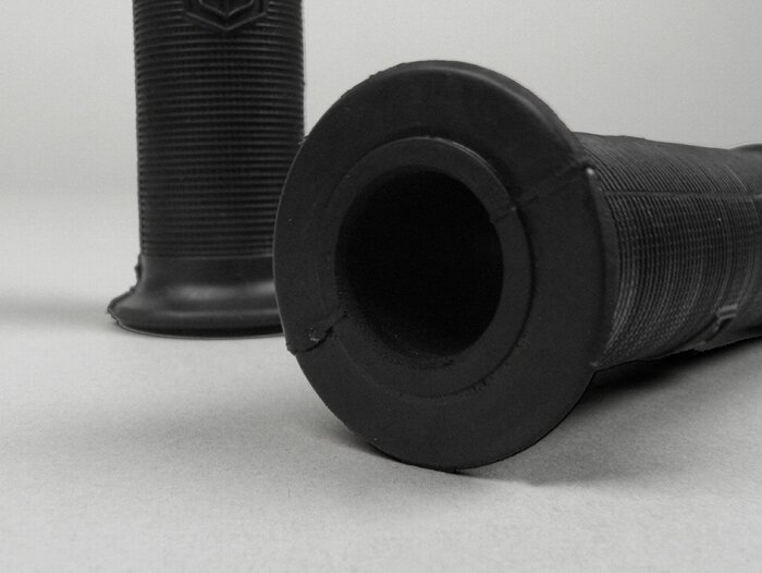 Pair of grips for handlebar indicators -PREMIUM Ø=21mm l=120mm, Piaggio hexagonal logo- retro fit VNB3T, VNB4T, VNB5T, VB1T, VBA, VBB, VGL1T, Touren, T4 (VGLA, VGLB), GS150 (VS2-5), GS160/GS4 - black